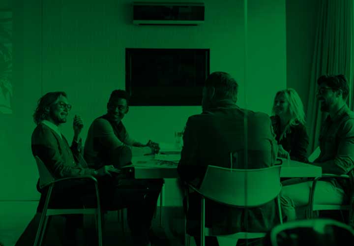 People around meeting table